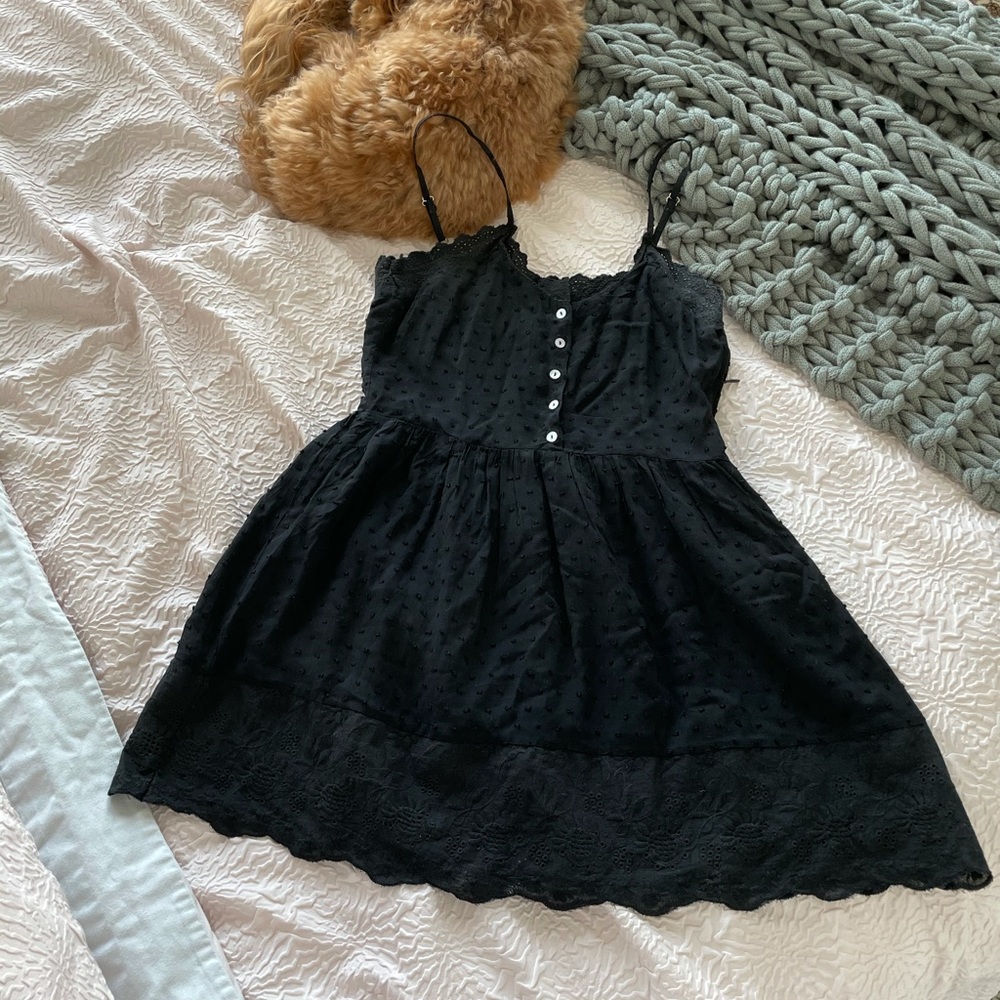 Black swiss dot and lace mini dress with side zip